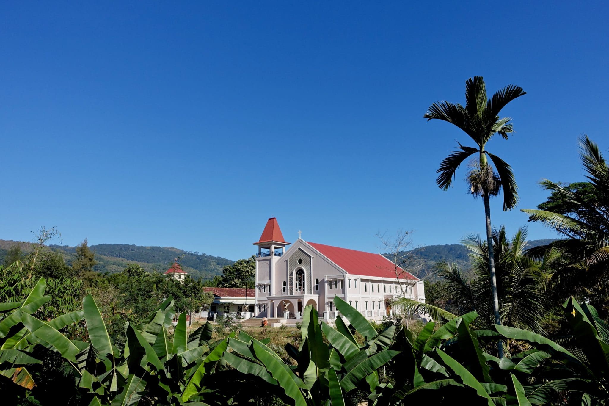 The new Railaco Parish church of Our Lady of Fatima is to be blessed and opened by the Bishop of Dili, His Lordship Bishop Virgilio do Carmo da Silva on October 7th this year to welcome the increasing numbers of people coming to Mass. The old church, seen in the background, will be used for much-needed parish Community activities.